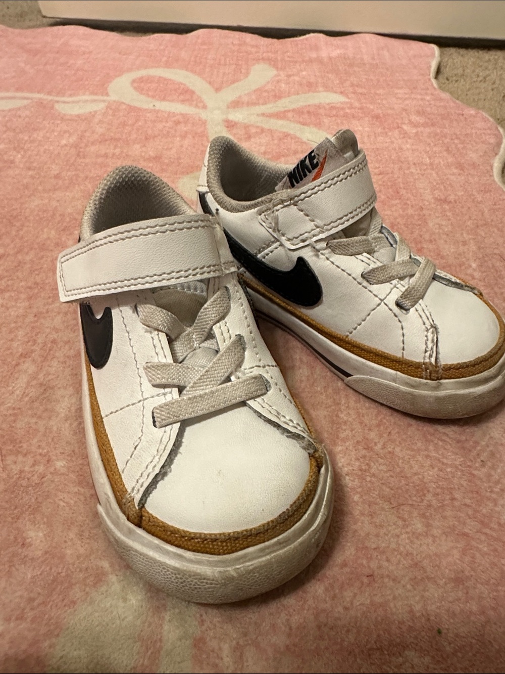 Nike Kids White Sneakers with Black Swoosh and Tan Trim